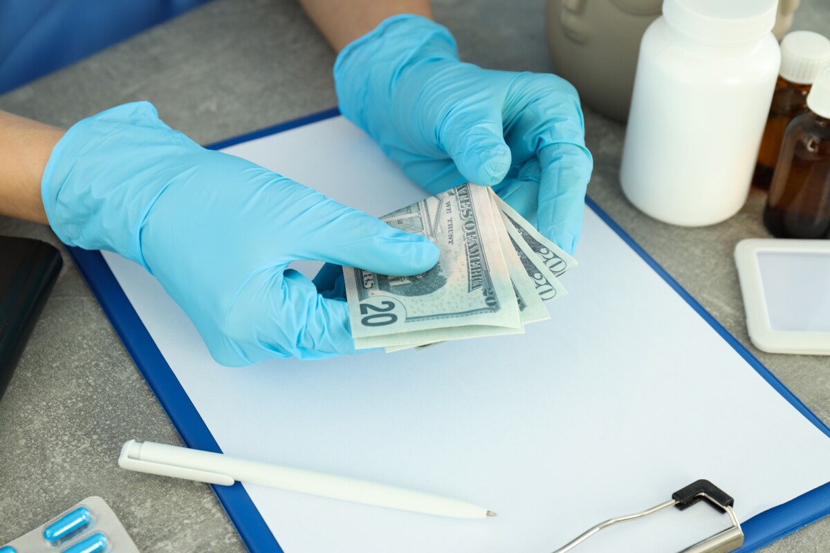 how health insurance make money