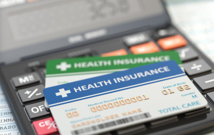 Paying Health Insurance With a Credit Card: Pros, Cons, and Fees